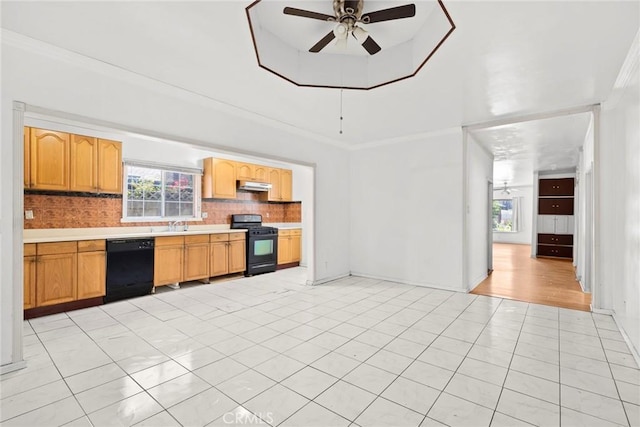1222 N Virgil Ave, Los Angeles, CA 90029 - kitchen featuring black appliances, a ceiling fan, light countertops, under cabinet range hood, and tasteful backsplash
