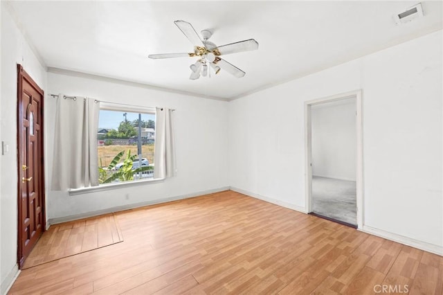 1222 N Virgil Ave, Los Angeles, CA 90029 - unfurnished bedroom featuring light wood-type flooring, baseboards, and a ceiling fan