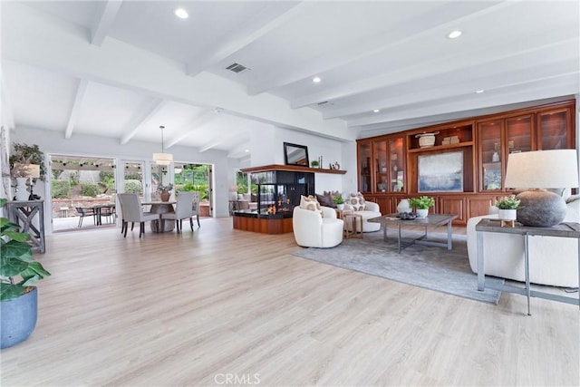 1929 Dorothea Rd, La Habra Heights, CA 90631 - living area with beam ceiling, light wood-style flooring, and recessed lighting