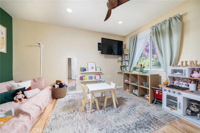2627 Mangrove Way, Riverside, CA 92506 - playroom featuring a ceiling fan, wood finished floors, and recessed lighting