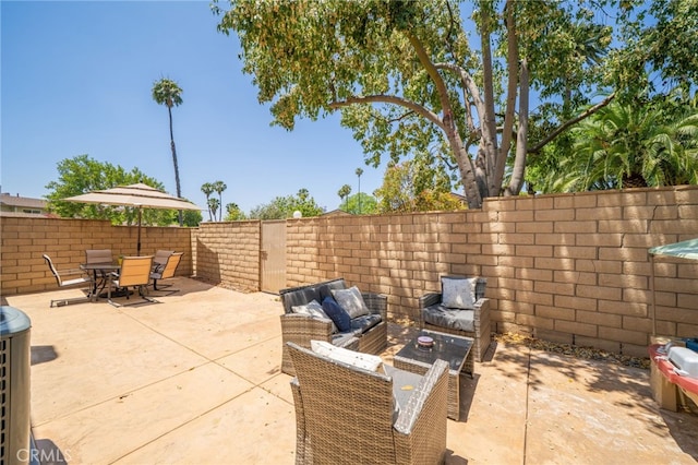 2627 Mangrove Way, Riverside, CA 92506 - fenced backyard featuring an outdoor living space, a patio, and outdoor dining area