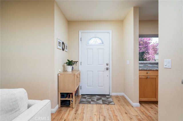 2627 Mangrove Way, Riverside, CA 92506 - foyer with light wood-type flooring and baseboards