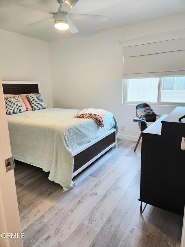 3125 Harbor Blvd, Oxnard, CA 93035 - bedroom featuring wood finished floors and a ceiling fan