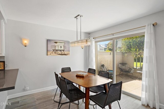 3125 Harbor Blvd, Oxnard, CA 93035 - dining space featuring wood finished floors and baseboards