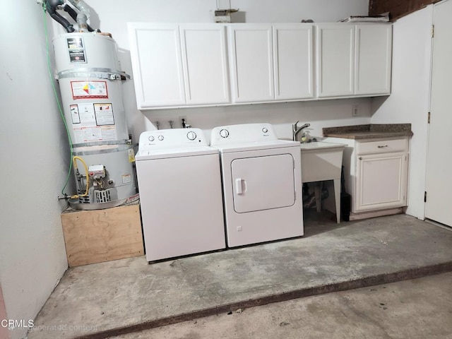 3125 Harbor Blvd, Oxnard, CA 93035 - laundry area featuring cabinet space, washing machine and dryer, and water heater