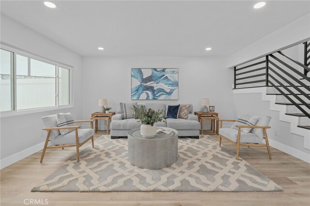 1468 Lemon Grove Dr, Upland, CA 91786 - living area featuring recessed lighting, baseboards, stairway, and light wood finished floors