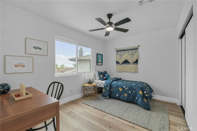 1468 Lemon Grove Dr, Upland, CA 91786 - bedroom with a closet, wood finished floors, baseboards, and a desk