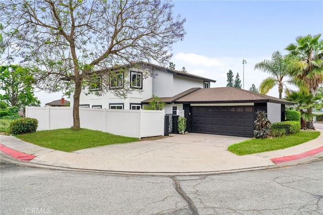 1468 Lemon Grove Dr, Upland, CA 91786 - view of front of house featuring an attached garage, concrete driveway, and stucco siding