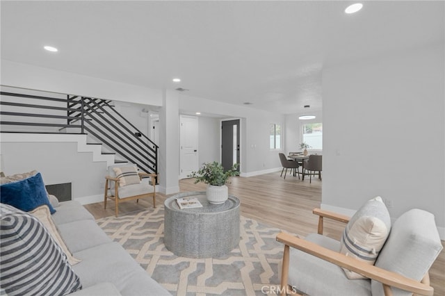 1468 Lemon Grove Dr, Upland, CA 91786 - living area featuring stairs, recessed lighting, light wood-style flooring, and baseboards