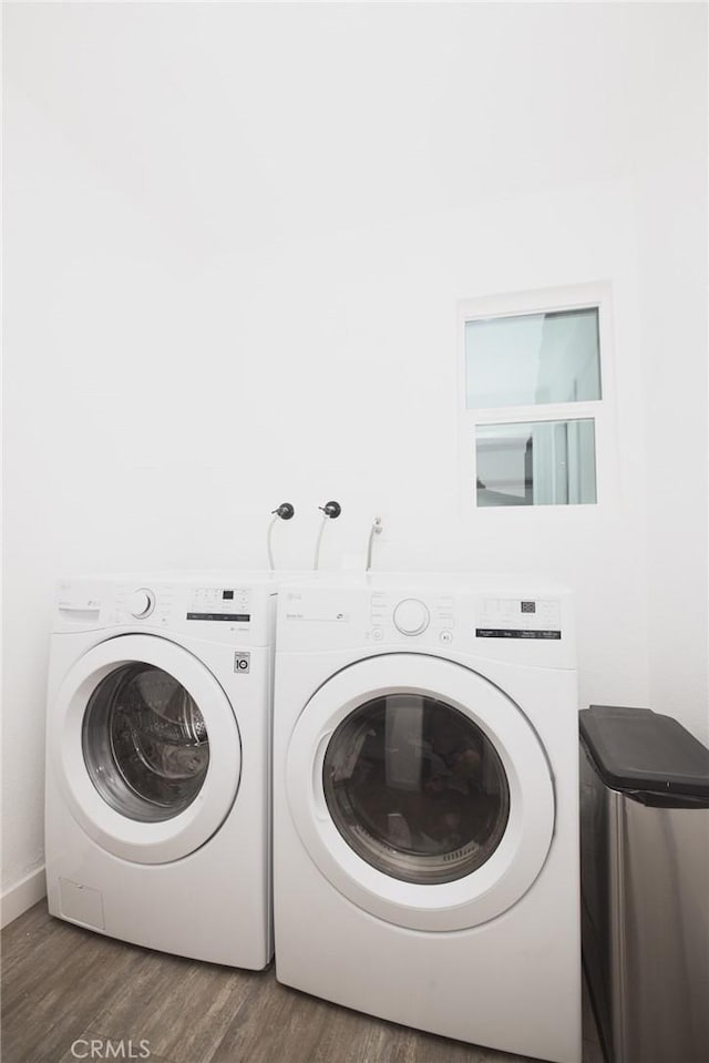 5760 Falling Leaf Ln, Jurupa Valley, CA 92509 - laundry room with washing machine and dryer and wood finished floors