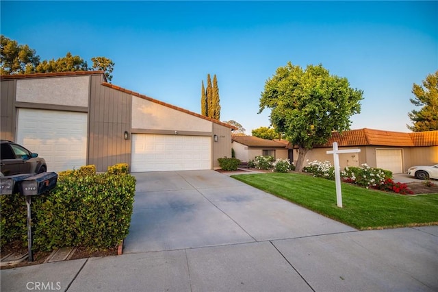 5760 Falling Leaf Ln, Jurupa Valley, CA 92509 - view of front of home featuring a front yard and driveway