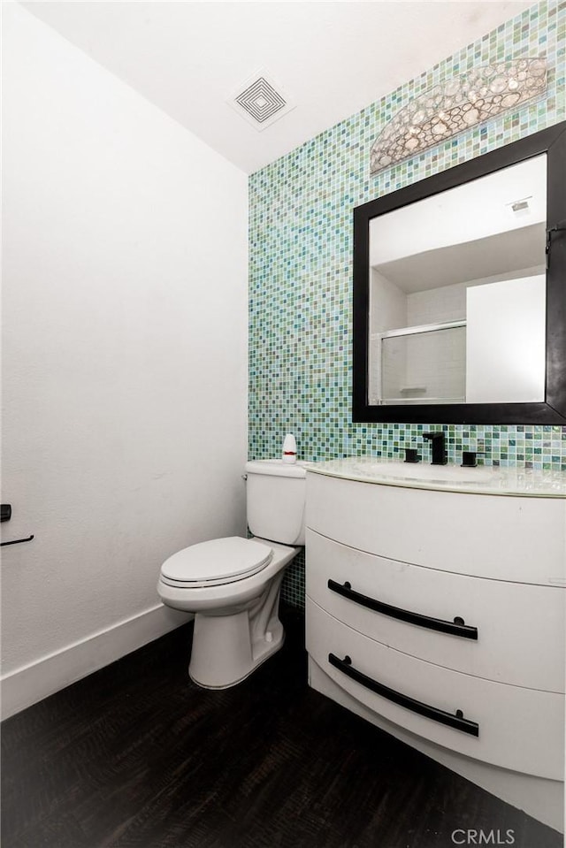 5760 Falling Leaf Ln, Jurupa Valley, CA 92509 - bathroom featuring vanity, a shower with shower door, and wood finished floors