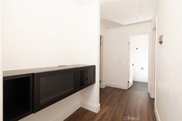 5760 Falling Leaf Ln, Jurupa Valley, CA 92509 - hallway with dark wood-type flooring and attic access