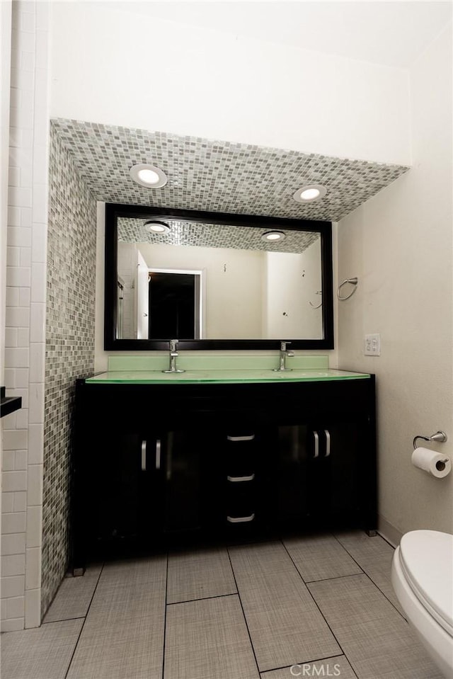 5760 Falling Leaf Ln, Jurupa Valley, CA 92509 - full bathroom featuring double vanity and toilet