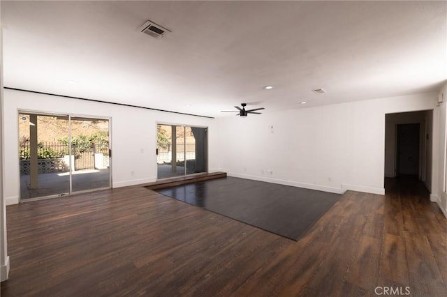 5760 Falling Leaf Ln, Jurupa Valley, CA 92509 - unfurnished living room with dark wood-style floors, ceiling fan, and recessed lighting