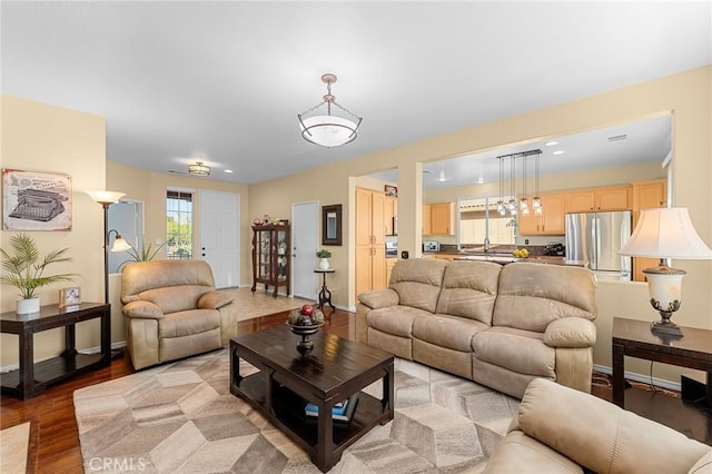 65565 Acoma Ave Unit 1, Desert Hot Springs, CA 92240 - living room with light wood-type flooring and recessed lighting