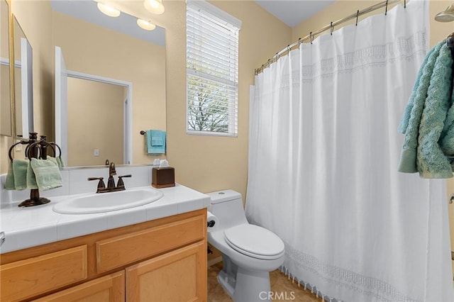 65565 Acoma Ave Unit 1, Desert Hot Springs, CA 92240 - full bath with vanity, tile patterned flooring, and a shower with curtain