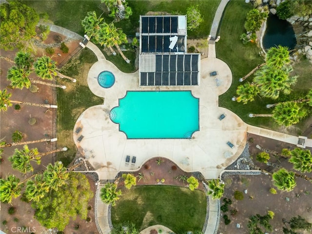 65565 Acoma Ave Unit 1, Desert Hot Springs, CA 92240 - drone / aerial view of a pool