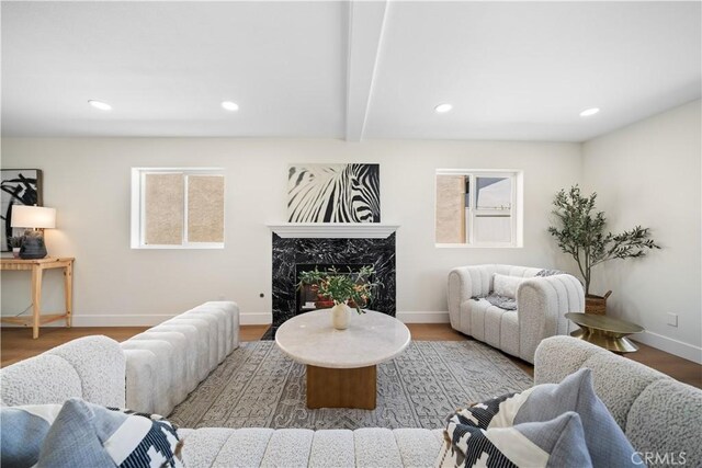 4431 W 138th St Unit B, Hawthorne, CA 90250 - living room featuring recessed lighting, wood finished floors, baseboards, beamed ceiling, and a premium fireplace