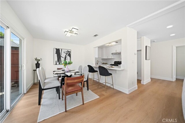 4431 W 138th St Unit B, Hawthorne, CA 90250 - dining room featuring light wood-style floors and baseboards