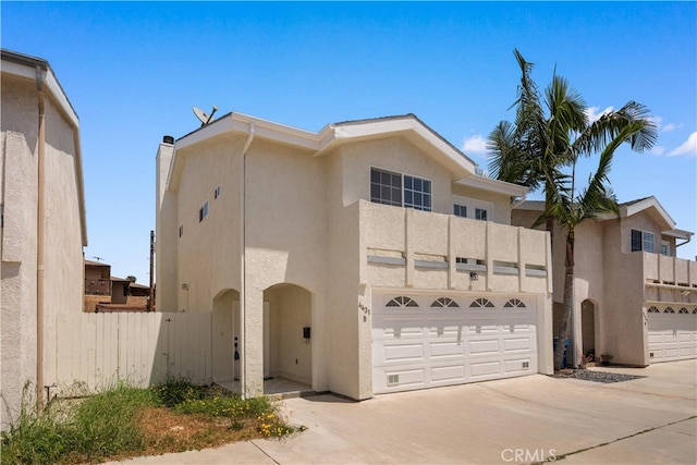 4431 W 138th St Unit B, Hawthorne, CA 90250 - view of front of home featuring stucco siding, driveway, and a garage