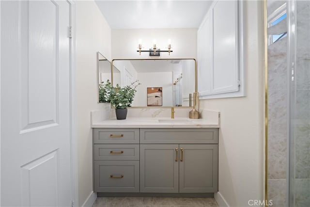 4431 W 138th St Unit B, Hawthorne, CA 90250 - full bathroom featuring vanity, baseboards, and a shower