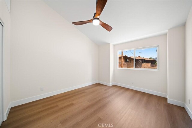 4431 W 138th St Unit B, Hawthorne, CA 90250 - spare room featuring lofted ceiling, wood finished floors, a ceiling fan, and baseboards