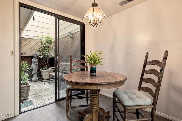 2025 Rosemont Ave Unit 2, Pasadena, CA 91103 - tiled dining area featuring a chandelier and baseboards