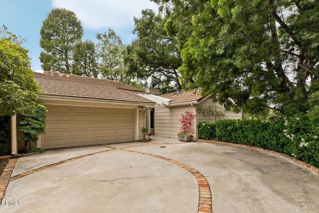 2025 Rosemont Ave Unit 2, Pasadena, CA 91103 - ranch-style home featuring driveway, a tile roof, and an attached garage
