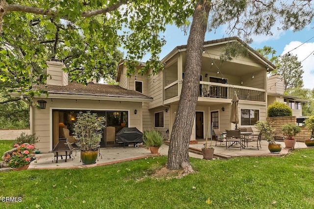 2025 Rosemont Ave Unit 2, Pasadena, CA 91103 - rear view of property with a balcony, a patio area, a yard, and a chimney