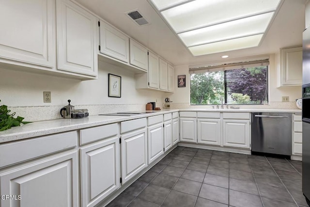 2025 Rosemont Ave Unit 2, Pasadena, CA 91103 - kitchen with dishwasher, white cabinets, dark tile patterned floors, a sink, and light countertops