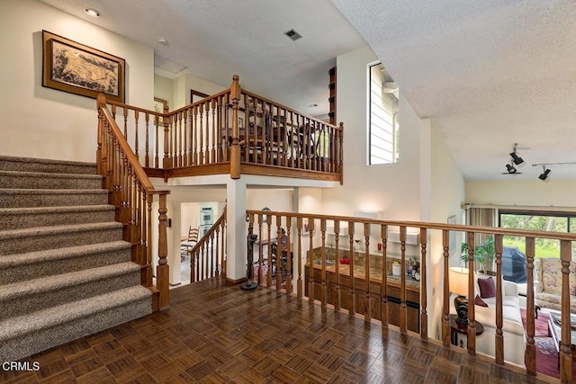 2025 Rosemont Ave Unit 2, Pasadena, CA 91103 - stairs with a textured ceiling