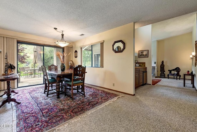 2025 Rosemont Ave Unit 2, Pasadena, CA 91103 - dining space with light colored carpet, a textured ceiling, and baseboards