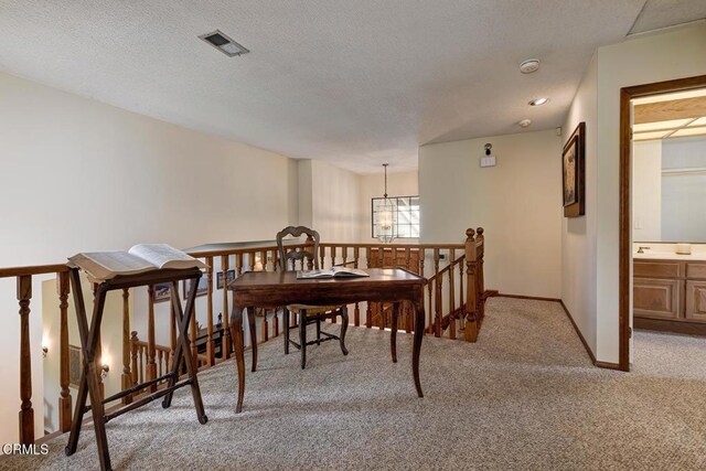 2025 Rosemont Ave Unit 2, Pasadena, CA 91103 - dining area featuring light colored carpet, a chandelier, and baseboards