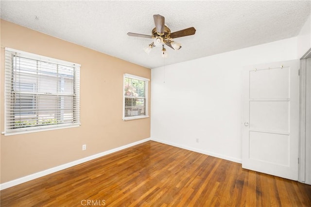 4660 Whitney Dr, El Monte, CA 91731 - spare room with wood finished floors, a ceiling fan, baseboards, and a textured ceiling