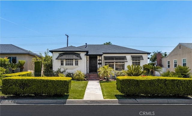 4660 Whitney Dr, El Monte, CA 91731 - bungalow with stucco siding and a front yard