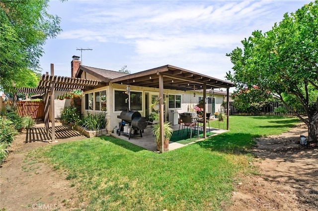 7052 Manhattan Dr, Riverside, CA 92506 - back of house with a pergola, a chimney, a patio, and stucco siding