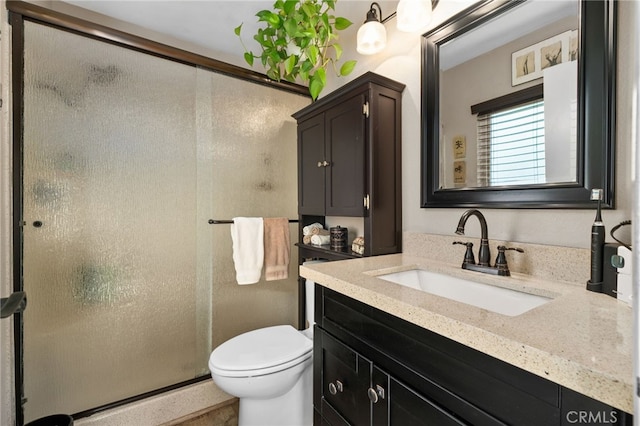 7052 Manhattan Dr, Riverside, CA 92506 - full bathroom featuring a stall shower, vanity, and toilet