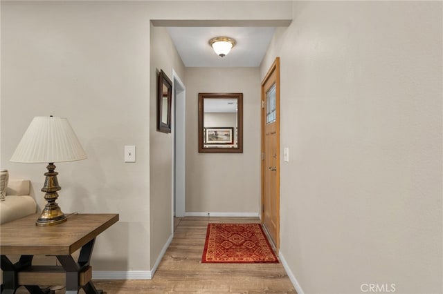 7052 Manhattan Dr, Riverside, CA 92506 - hall with light wood-style floors and baseboards