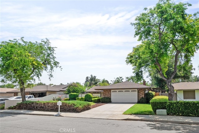 7052 Manhattan Dr, Riverside, CA 92506 - single story home with a garage, concrete driveway, and brick siding