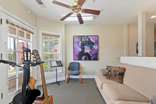 3845 10th St, Riverside, CA 92501 - carpeted living area featuring baseboards and a ceiling fan