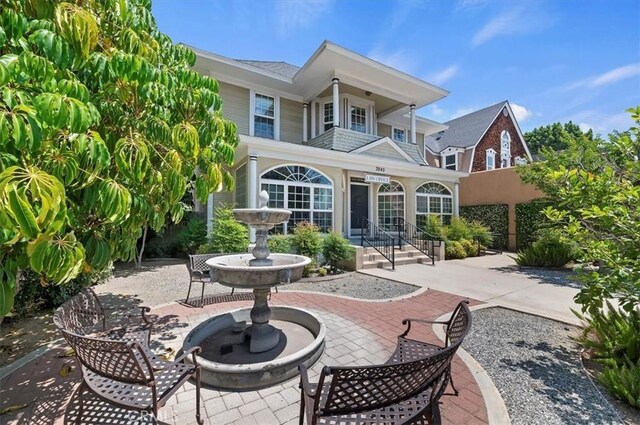 3845 10th St, Riverside, CA 92501 - rear view of house featuring a patio area