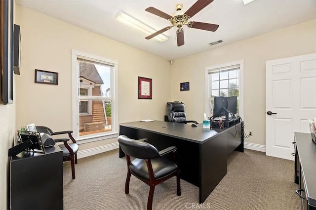 3845 10th St, Riverside, CA 92501 - office featuring dark carpet, ceiling fan, and baseboards