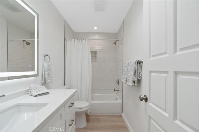 900 Cedar St Unit 308, El Segundo, CA 90245 - bathroom featuring wood finished floors, vanity, shower / bath combination with curtain, and recessed lighting