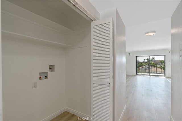 900 Cedar St Unit 308, El Segundo, CA 90245 - washroom featuring hookup for a washing machine and light wood-style flooring