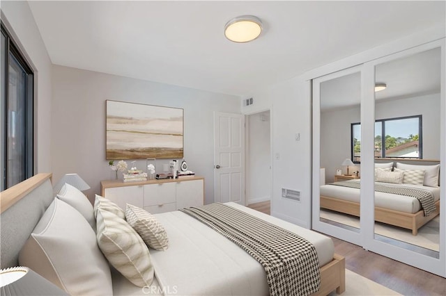 900 Cedar St Unit 308, El Segundo, CA 90245 - bedroom featuring light wood-style flooring and a closet