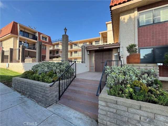 900 Cedar St Unit 308, El Segundo, CA 90245 - view of building exterior featuring a garage