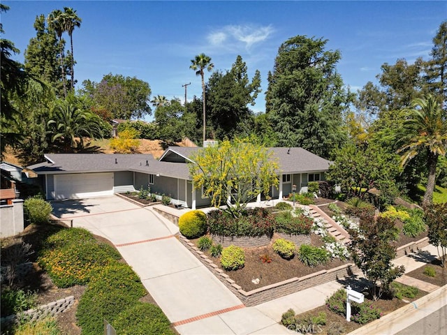 1330 S Center St, Redlands, CA 92373 - ranch-style house with concrete driveway and a garage