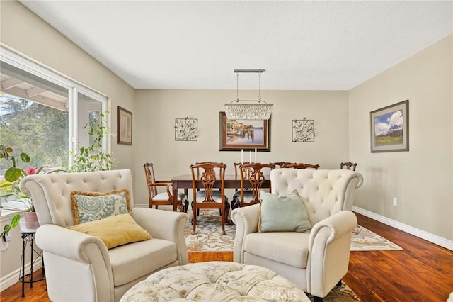 1330 S Center St, Redlands, CA 92373 - living area with baseboards and wood finished floors