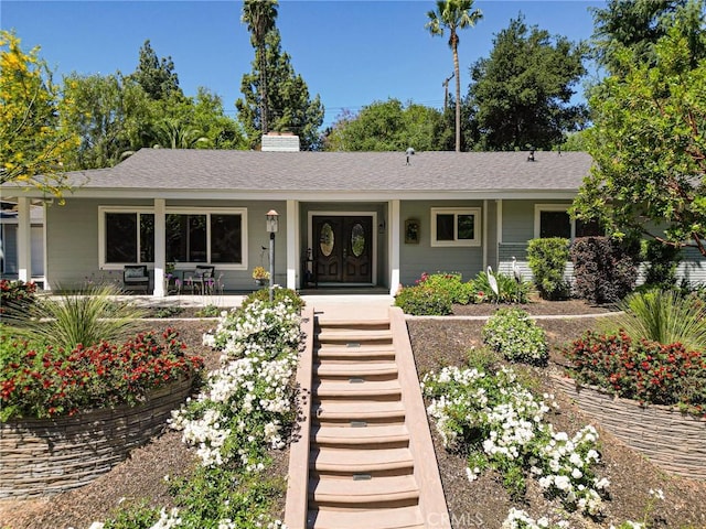 1330 S Center St, Redlands, CA 92373 - ranch-style home with stairs, roof with shingles, and a chimney